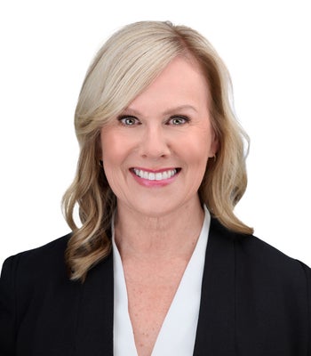 Portrait of Coralee Burrows, Real Estate Consultant.